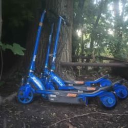 Three Razor Electric Scooters