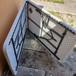 FOLDING TABLE 8FT - FOLDS IN HALF‼️ LIKE NEW- USED ONCE