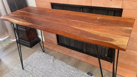 live-edge wood console table with black metal hairpin legs featuring a solid Indian rosewood slab top