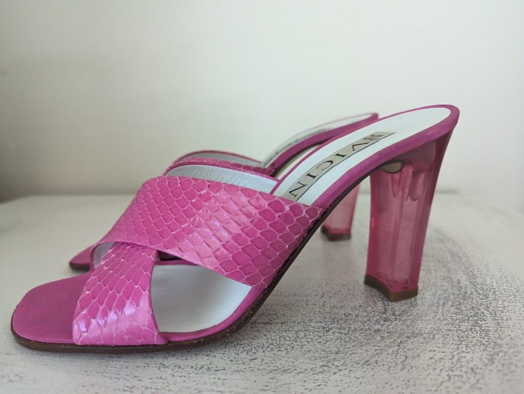  woman's hot pink high heels with hot pink Lucite heel size 8 they are like Barbie doll shoes 3 1/2 inch heels they were 170.00 