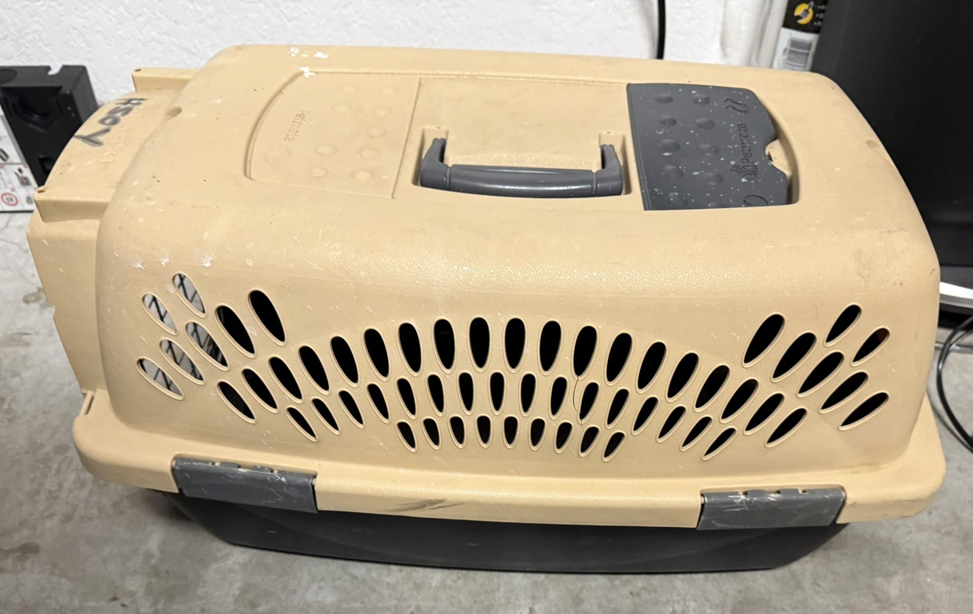Petmate Pet Taxi, a hard-sided pet carrier
