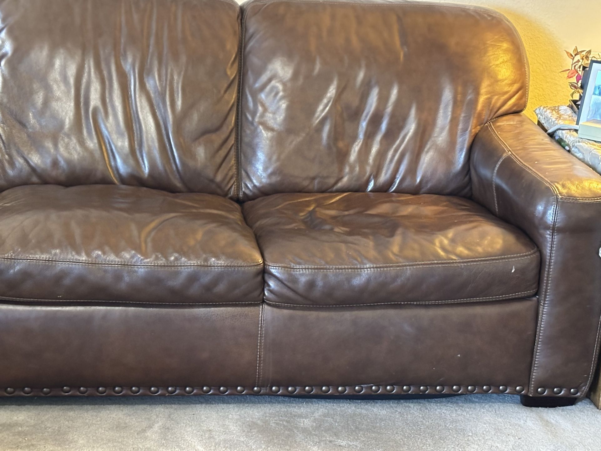 A Dark Brown Leather Sofa Normal Used