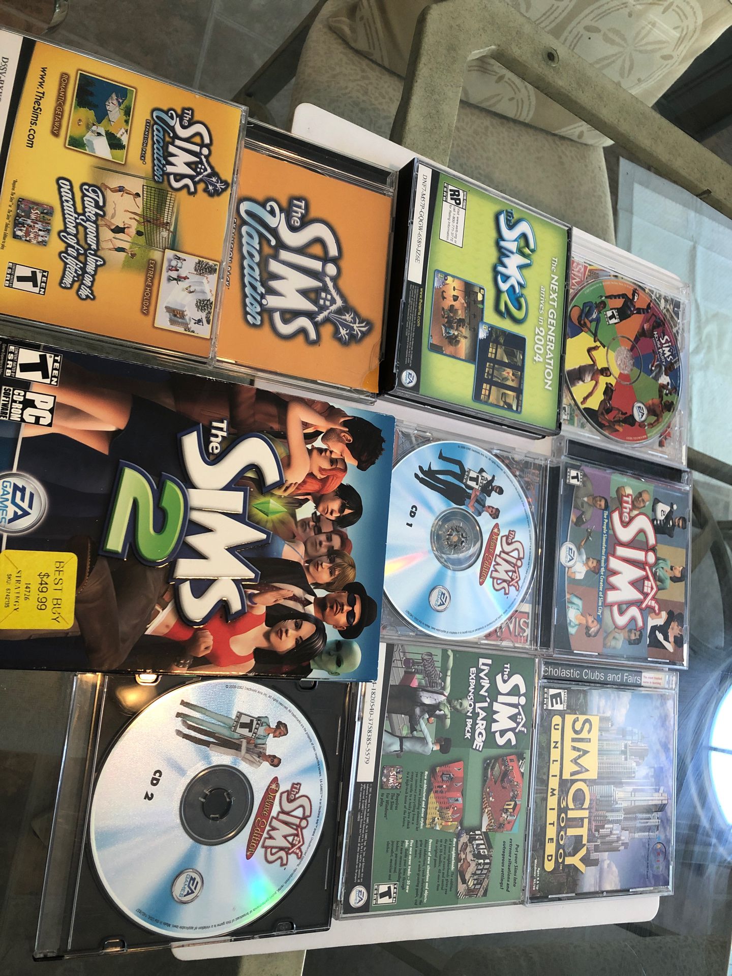 Over 200.00 worth of Sims computer games. Design your own home or city for the Sims