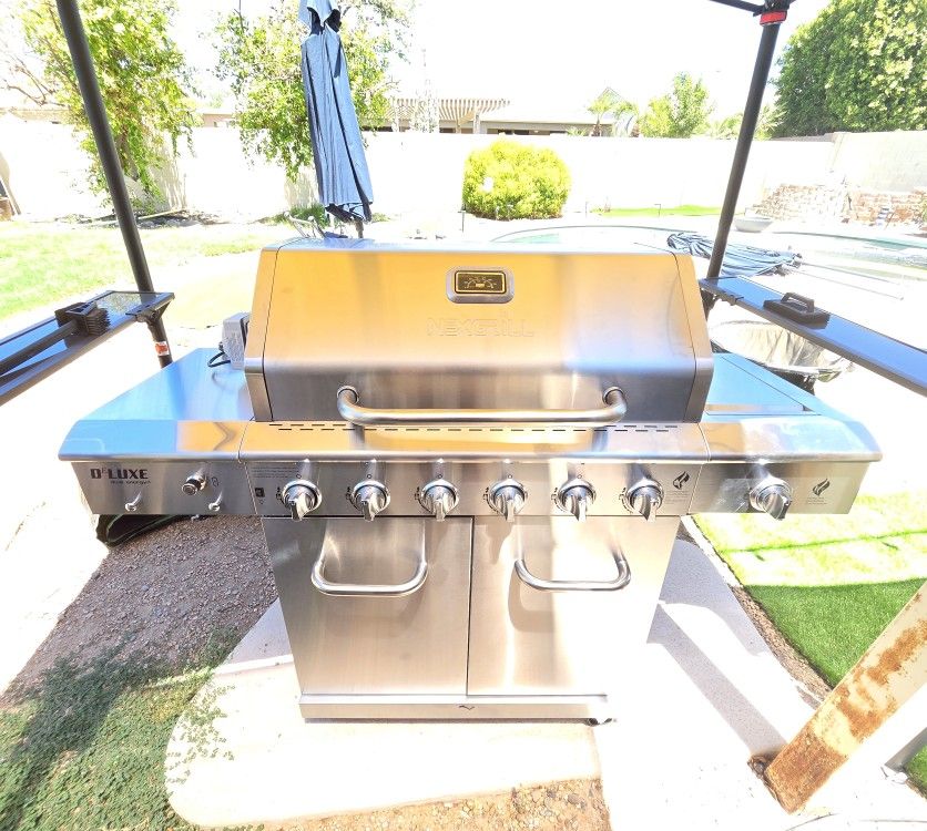 Nexgrill
Deluxe 6-Burner Propane Gas Grill in Stainless Steel with Ceramic Searing Side Burner and Rotisserie Kit