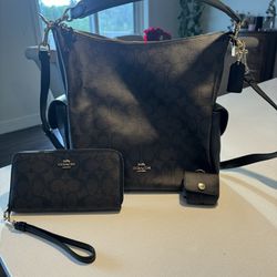 Coach Purse, Wallet And AirPod Case $100