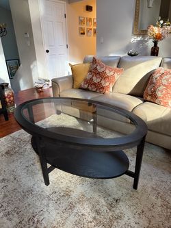 Oval Glass Top Coffee Table with Lower Shelf