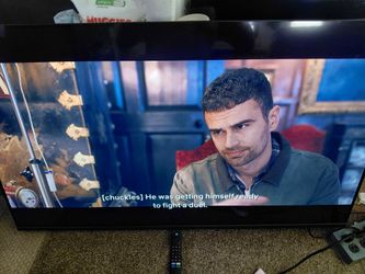 Insignia 65 inch smart t.v with remote and wall mount