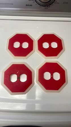 Stop sign outlet covers