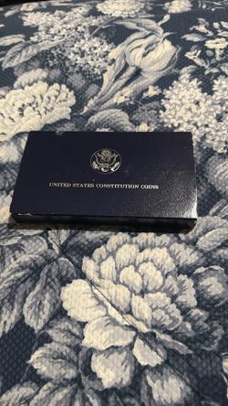 1987 Silver Dollar With The People With Box And Papers