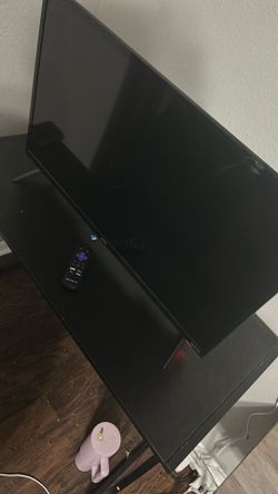Tv with desk and gaming chair