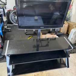 Tv stand with 30” Samsung TV
