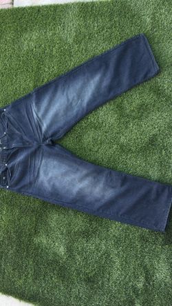 Navy blue straight leg jeans with embroidered details