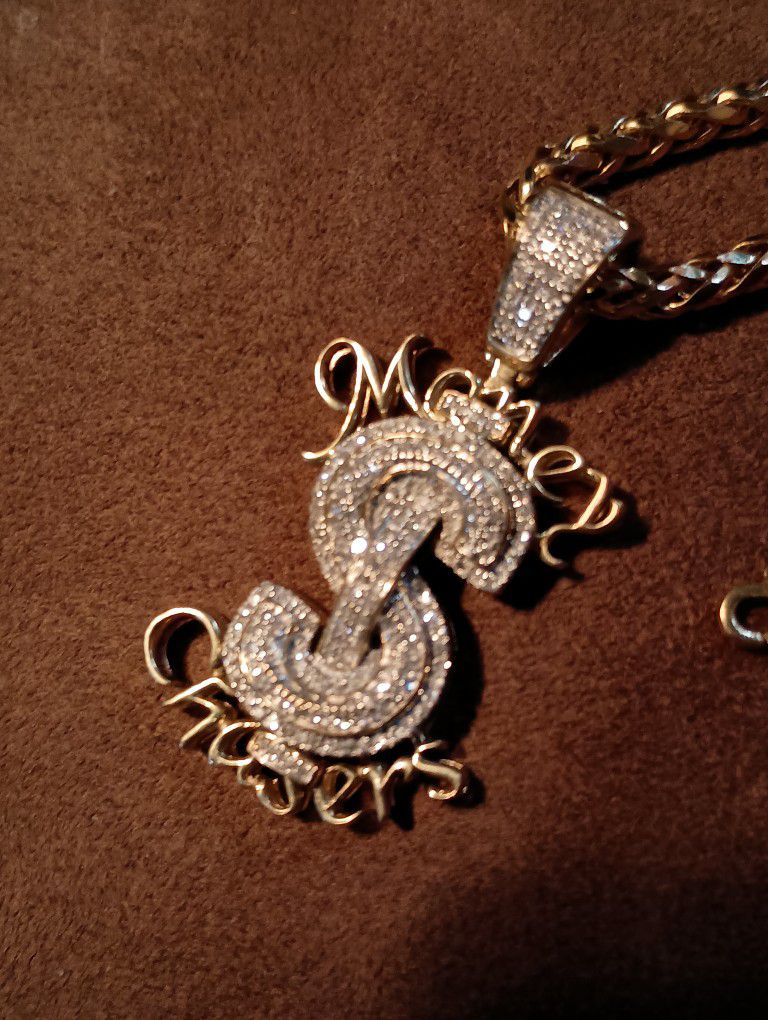 10k gold iced out Louis Vuitton pendant only available for a