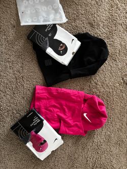 Hot pink and black nike ski masks