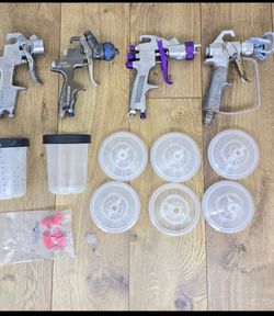 Collection of Paint Spray Guns and Related Tools and Hardware