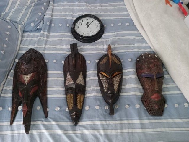 African Mask And Clock