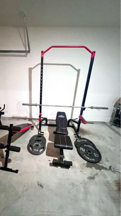 Squat rack, barbell, weights, 2 benches