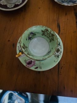 Antique Floral Porcelain Teacup and Saucer