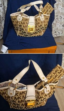 gently use Michael Kors gold and white handbag and wallet to match