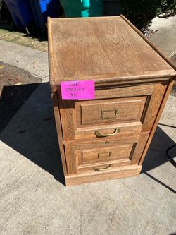 Oak file cabinet $10
