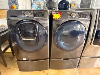 Used Black Samsung Tall Washer and Dryer Storage