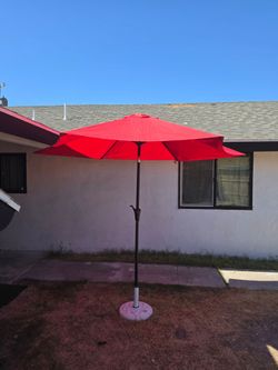 Outdoor umbrella with stand