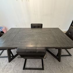 Wooden Table And Leather Chairs