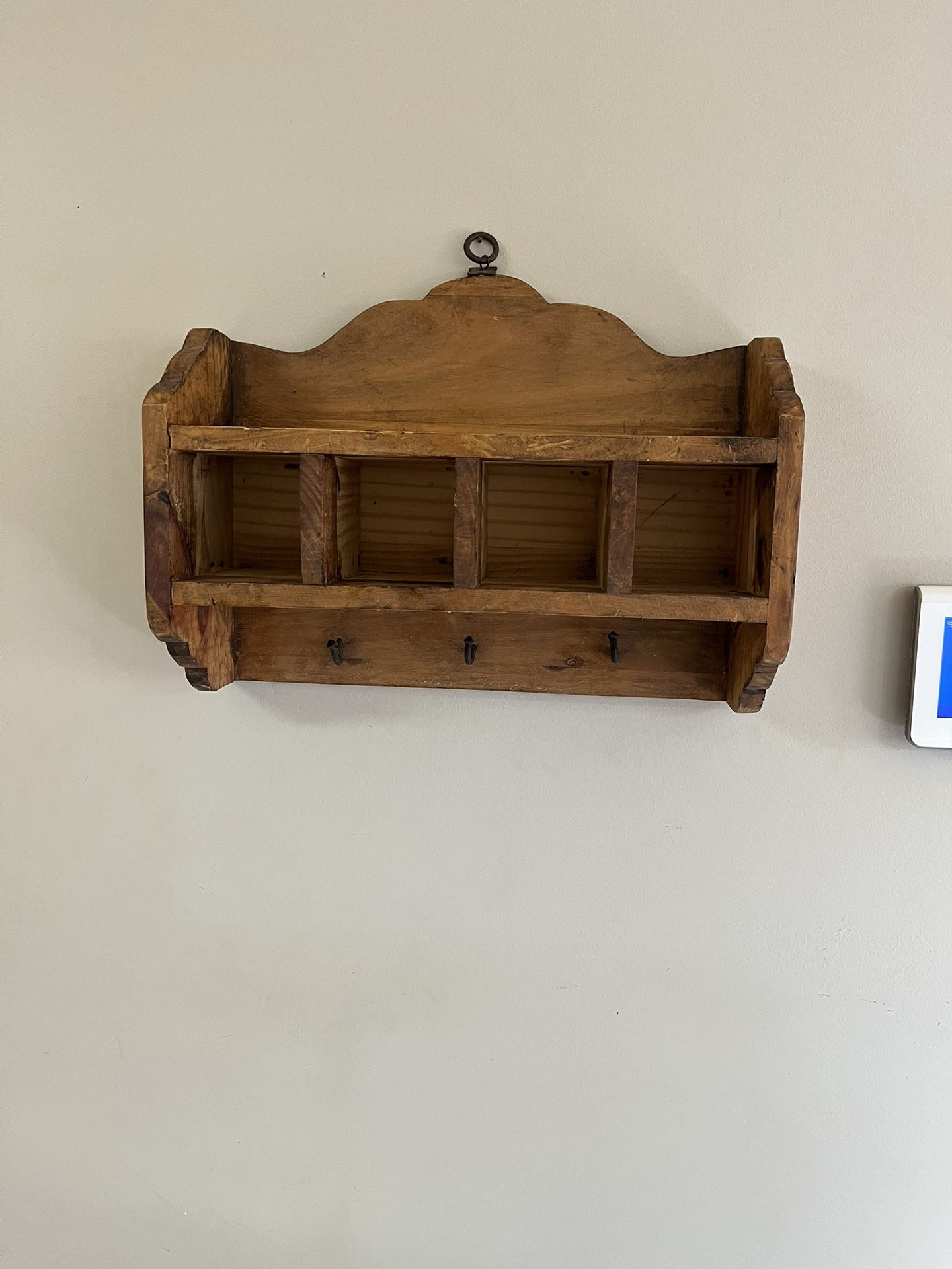 Antique hanging shelf with four compartments and key hooks