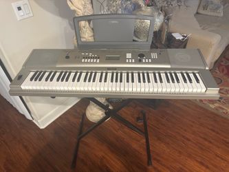 Yamaha YPG-235 76key digital piano with stand.