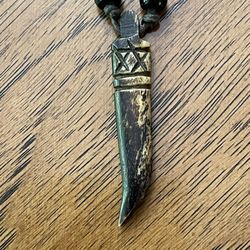 Rope Necklace with 2 Beads and a Carved Tribal Pendant