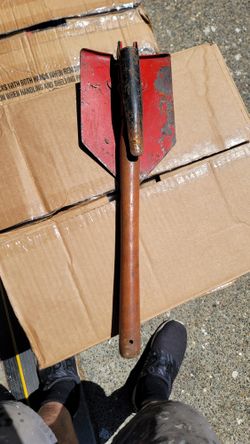 Old Camping Shovel And Pick Axe