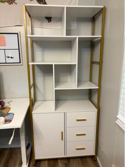 White bookshelf with cabinets