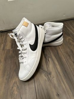 Nike Court Royale 2 Mid sneakers in white with a prominent black Swoosh logo. Size 10