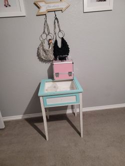 Table, Makeup Box And Purses
