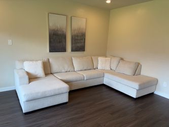 Like New Living Spaces Sectional send offers
