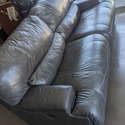 Two Electric Reclining Leather Couches 