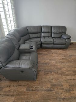 L-shaped grey leather electric sectional