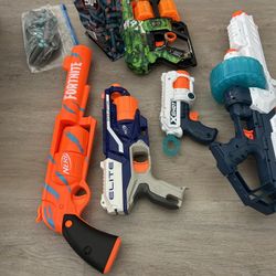 3 X-Shot blasters, 2 nerf blasters ( with bullets)