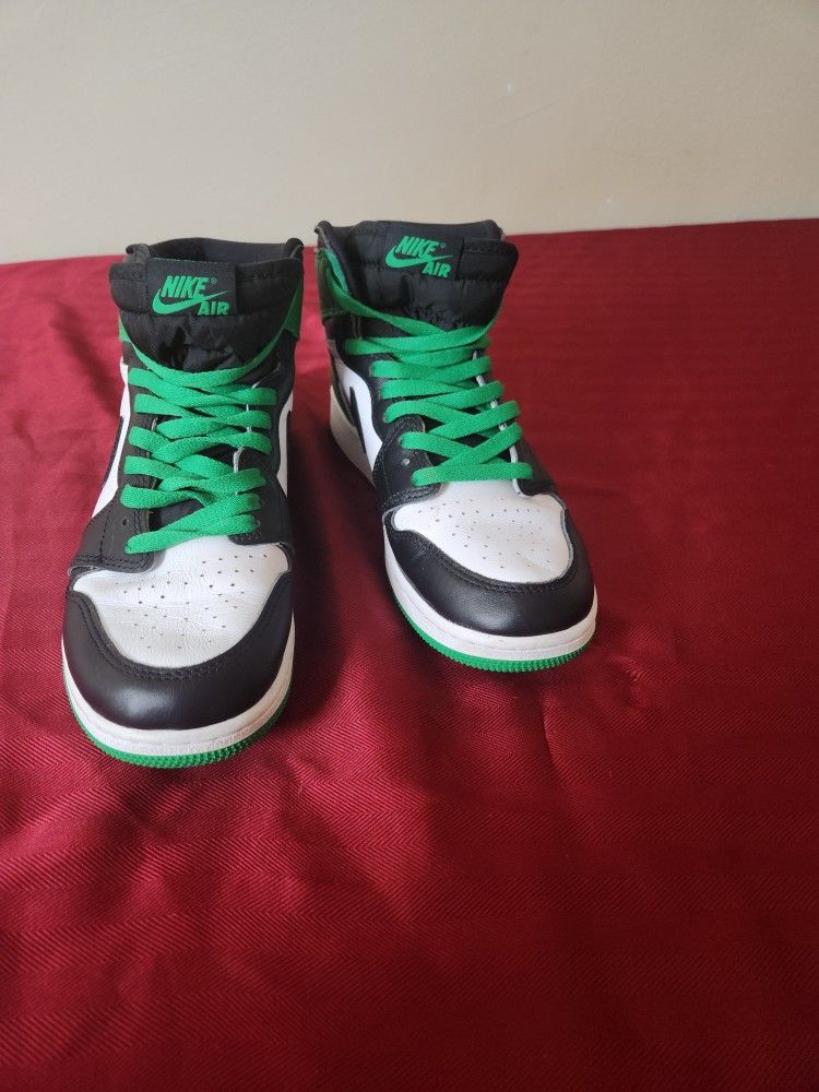 This is an Air Jordan 1 Retro High OG "Lucky Green"  
