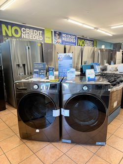 LG 5.0 cu. ft. Black Steel Front Load Smart Washer with TurboWash and 7.4 Cu.Ft Gas Dryer