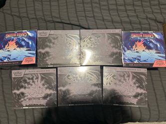7 sealed Pokemon ETBs