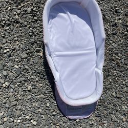 Portable changing pad at station