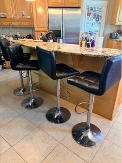 4 black high bar  swivel stools