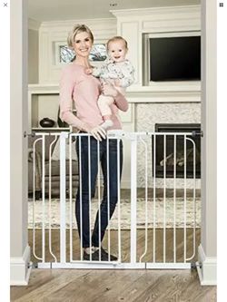 Tall and wide adjustable baby gate. Opening up to 49 inches wide adjustable 37 inches high it’s new