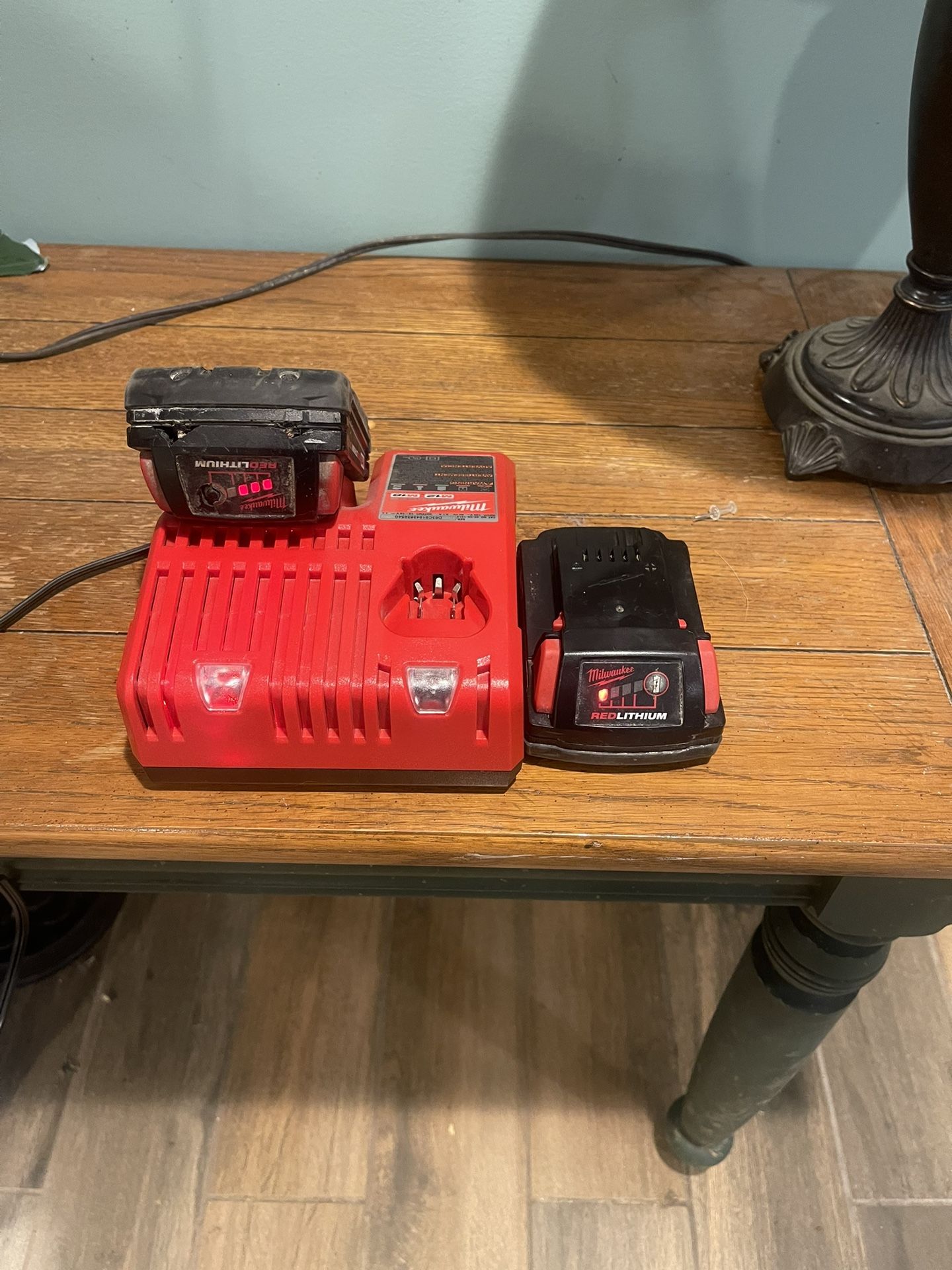 Milwaukee Charger And 2 Batteries