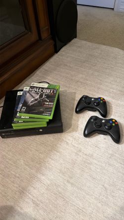 X box 360 + 4 games + 2 controllers