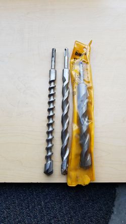 Rotary hammer drill bits