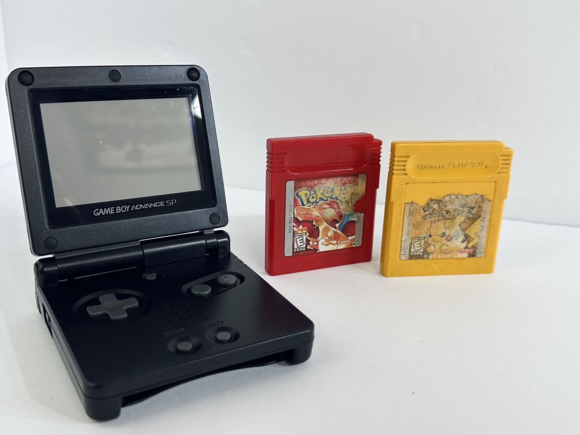 Black Nintendo Gameboy Advance SP With Authentic Pokemon Red And Pokemon Yellow