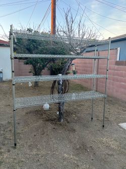 Stock rack hig 72” long 72” wide 18” ask $60