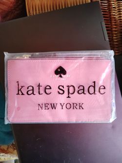 Kate Spade New York Pink Zip wristlet brand new in packaging with tag! Super cute!!
